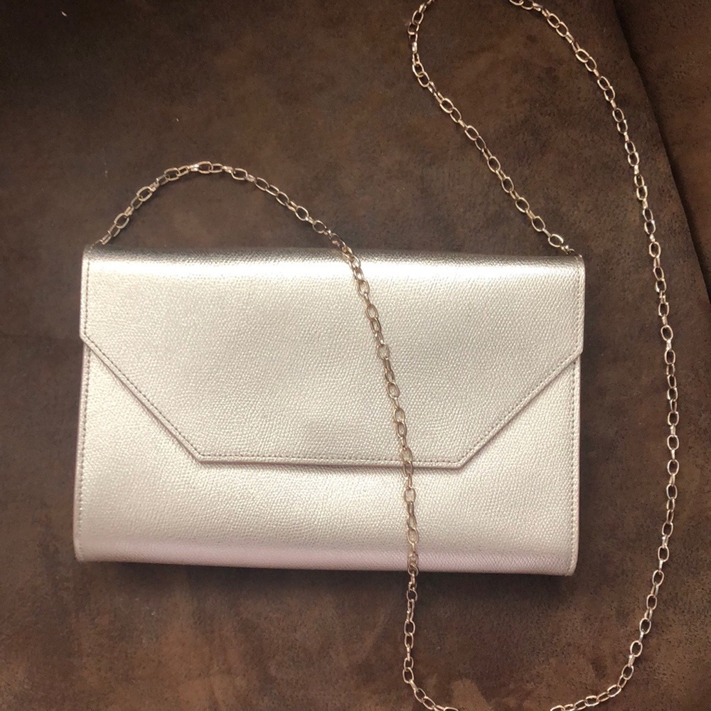 Gold ‘halogen’ hand bag with gold chain strap